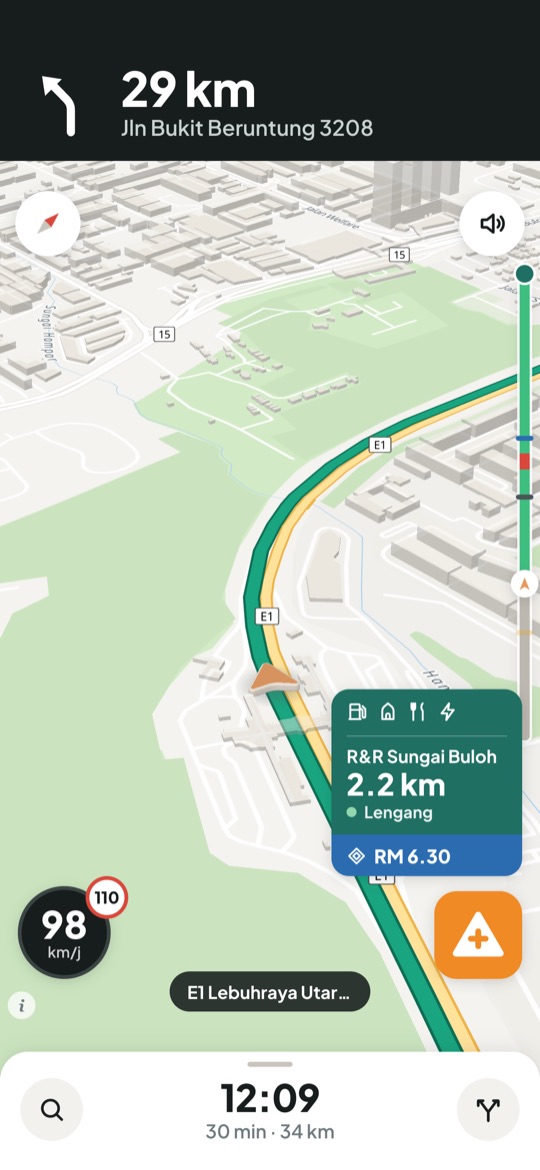 Driving screen with an R&R Sungai Buloh card, 2.2 km ahead, and a toll estimate of RM 6.30.